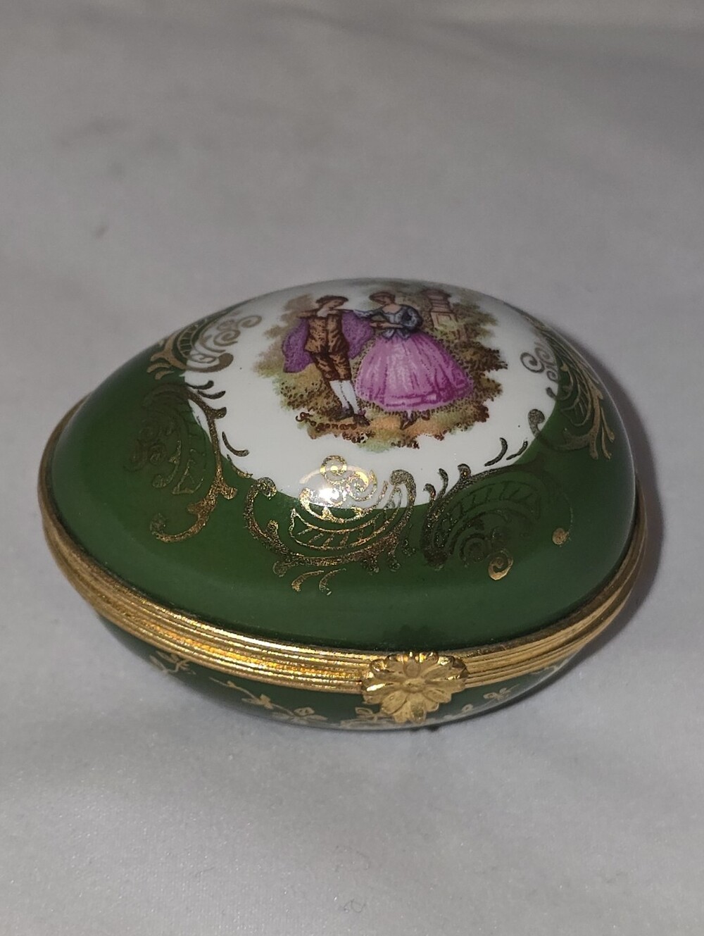 Vintage La Reine Limoges egg-shaped porcelain trinket box